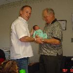 Dad gives his father a grandson :)....